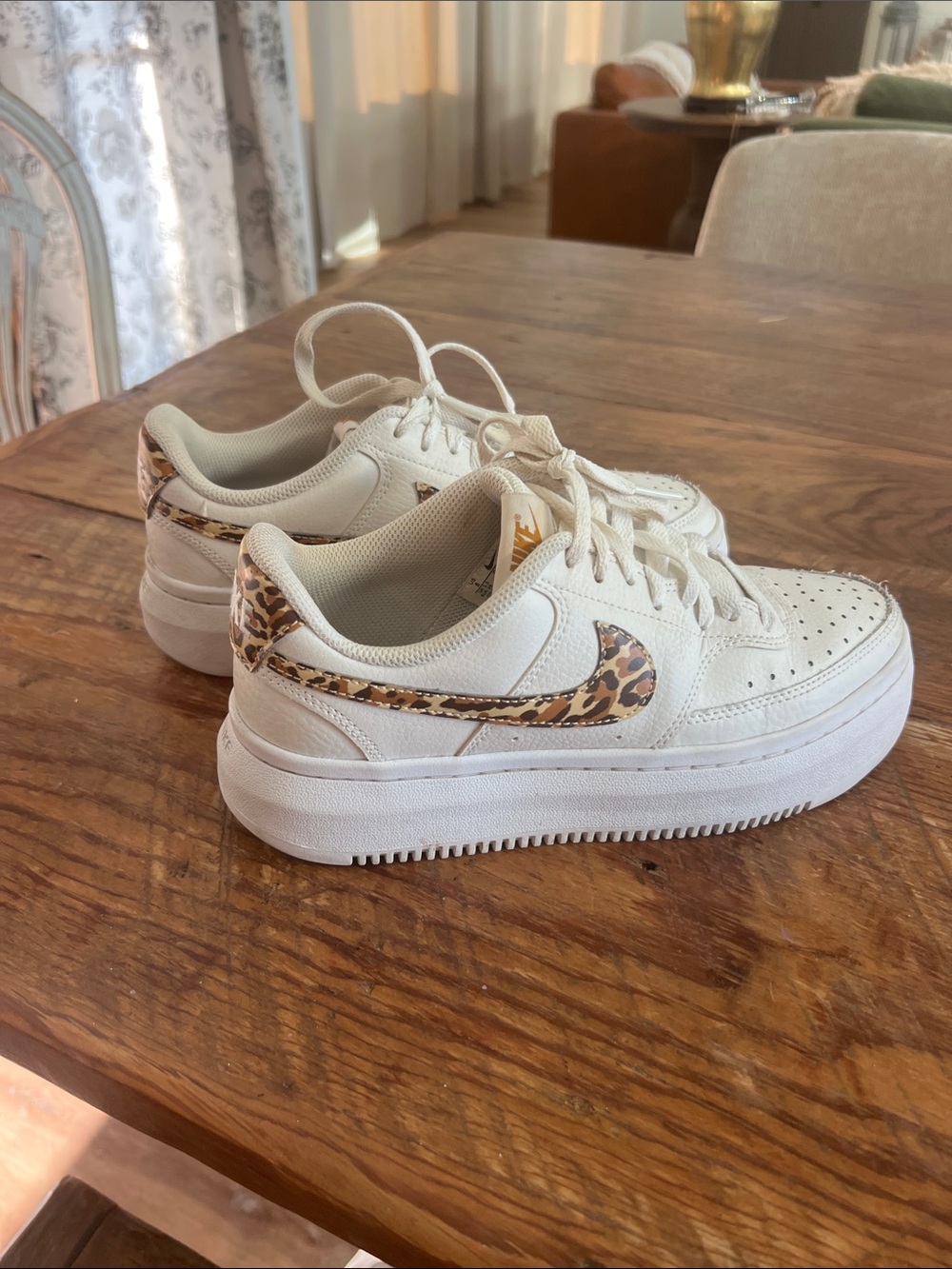 Nike Cream Platform Sneakers with Leopard Swoosh
